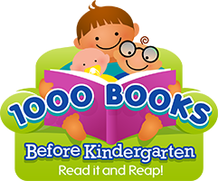 A young child, baby and bookworm read an open book and smiling. 1000 Books Before Kindergarten. Read it and reap!